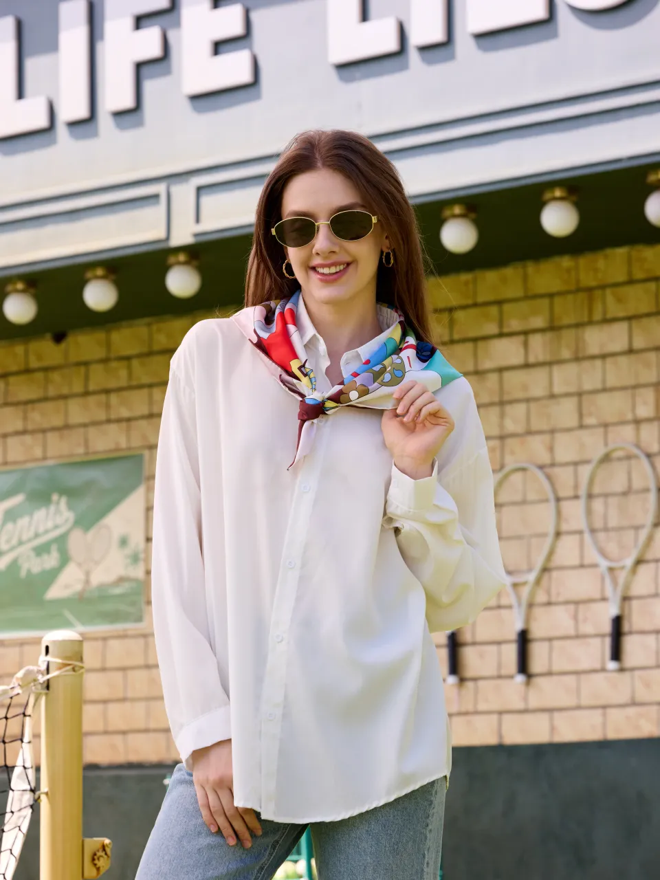 Zodiac Silk Scarf-Multicolor — styled around the neck