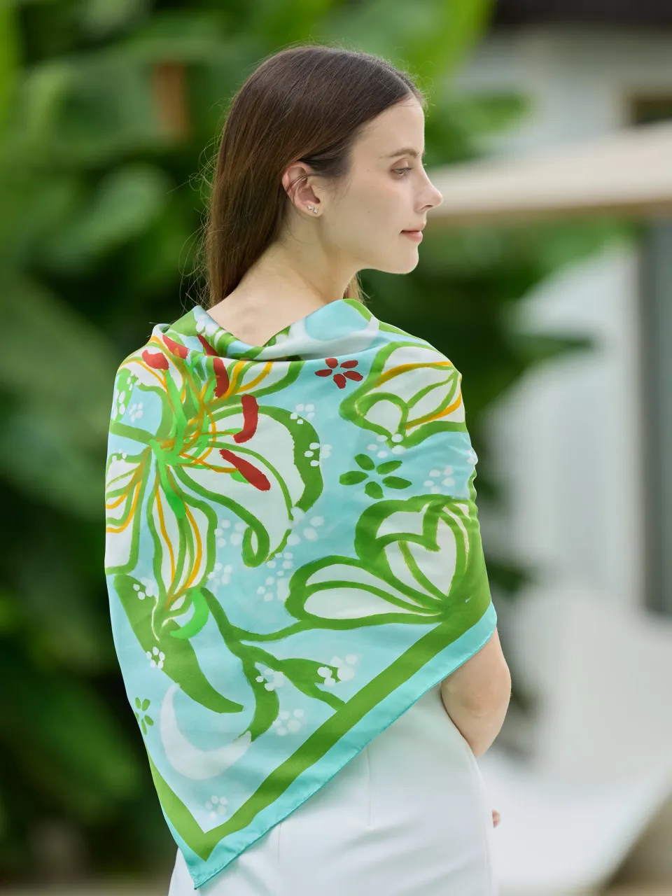 Moonlit Lily Silk Scarf-Green/Aqua — draped over the shoulders