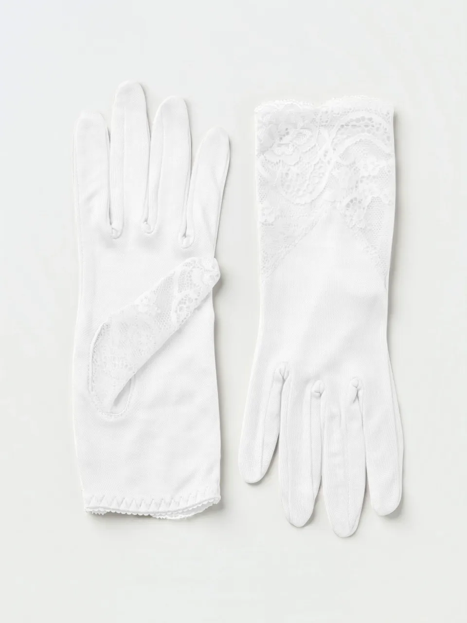 Pure Silk Lace Gloves in White — pair of gloves laid flat