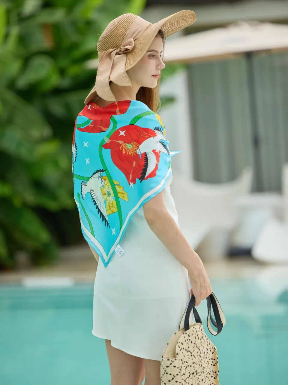 Bird and Poppy Silk Scarf-Turquoise/Red — draped over the shoulders