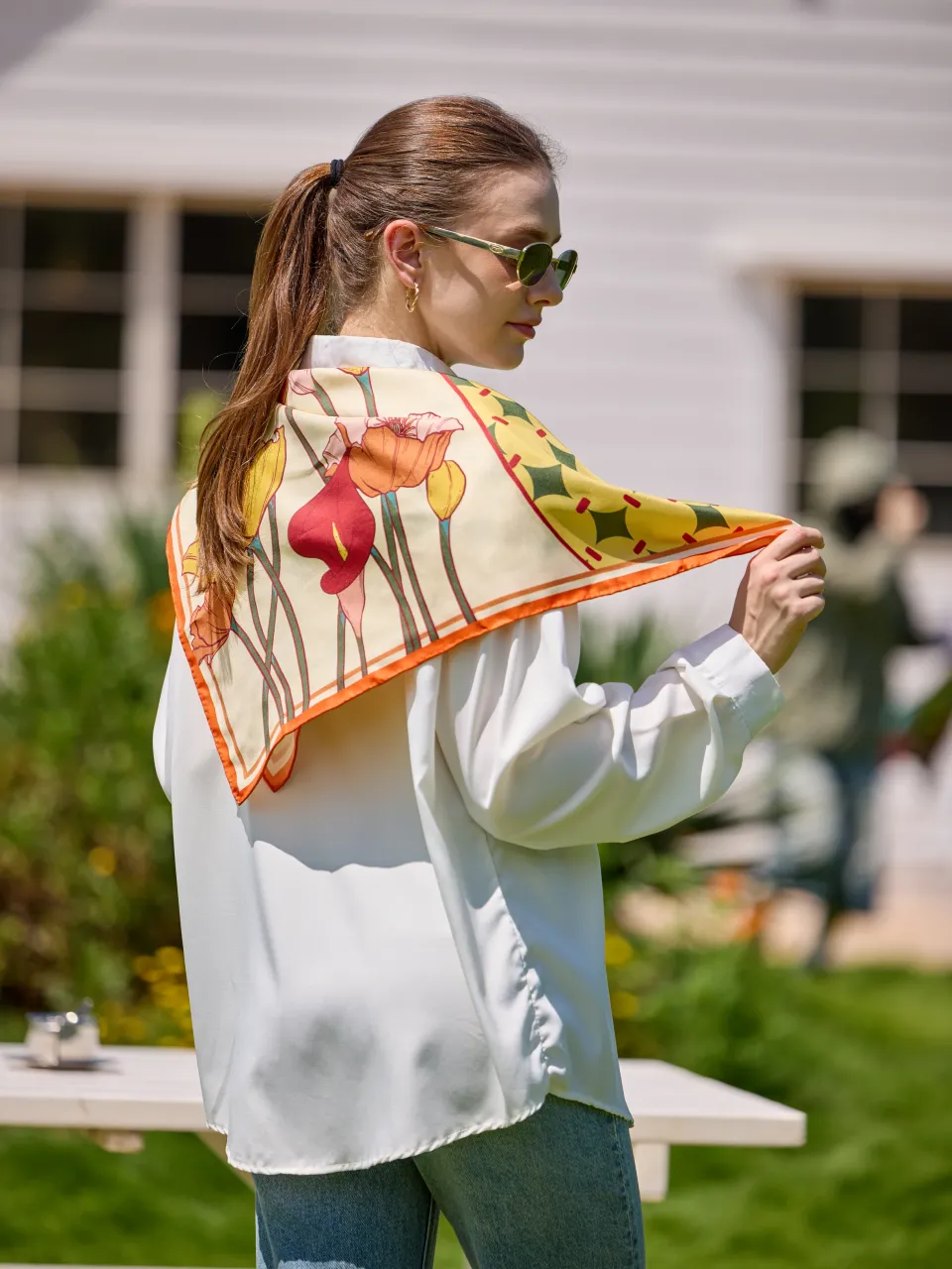 Calla Lily & Poppy Silk Scarf-Coral/Cream — draped over the shoulders