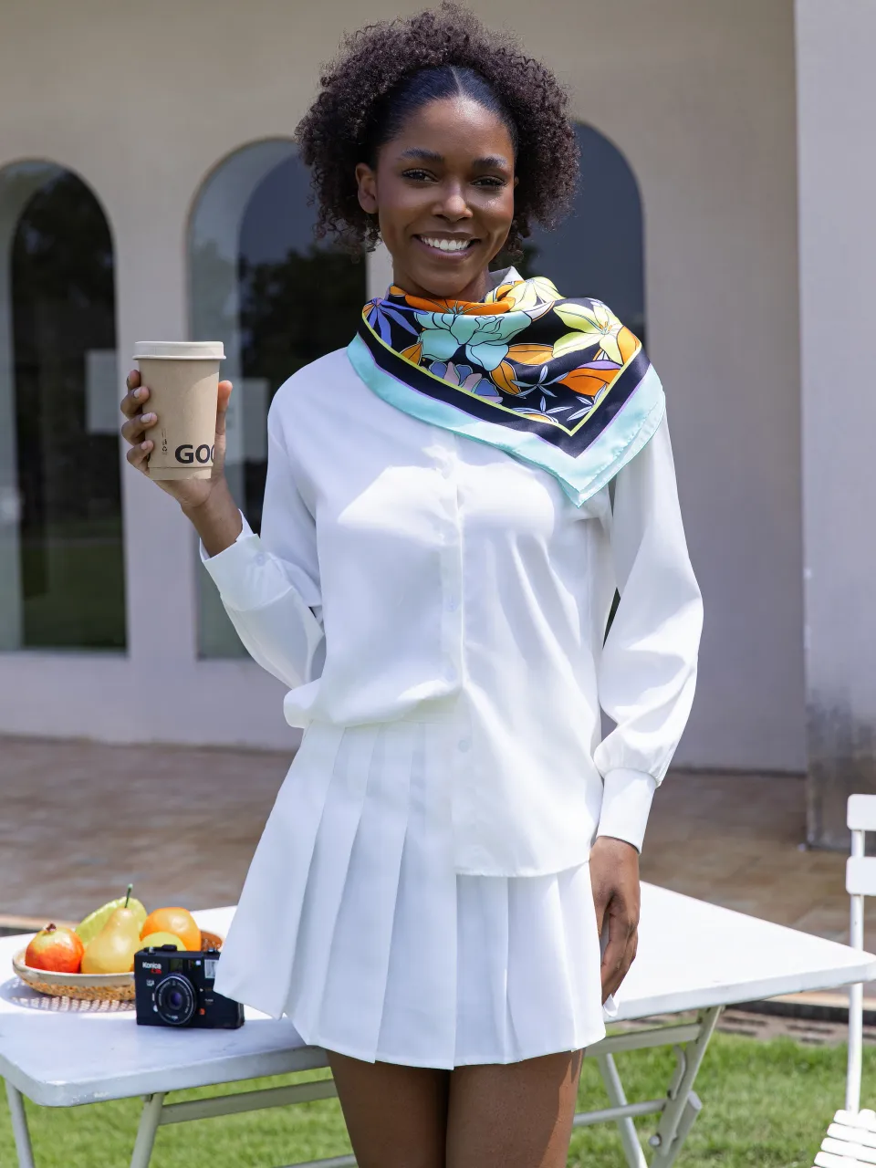 Allover Floral Silk Scarf-Aqua/Lavender/Orange/Yellow in Aqua/Black — styled around the neck