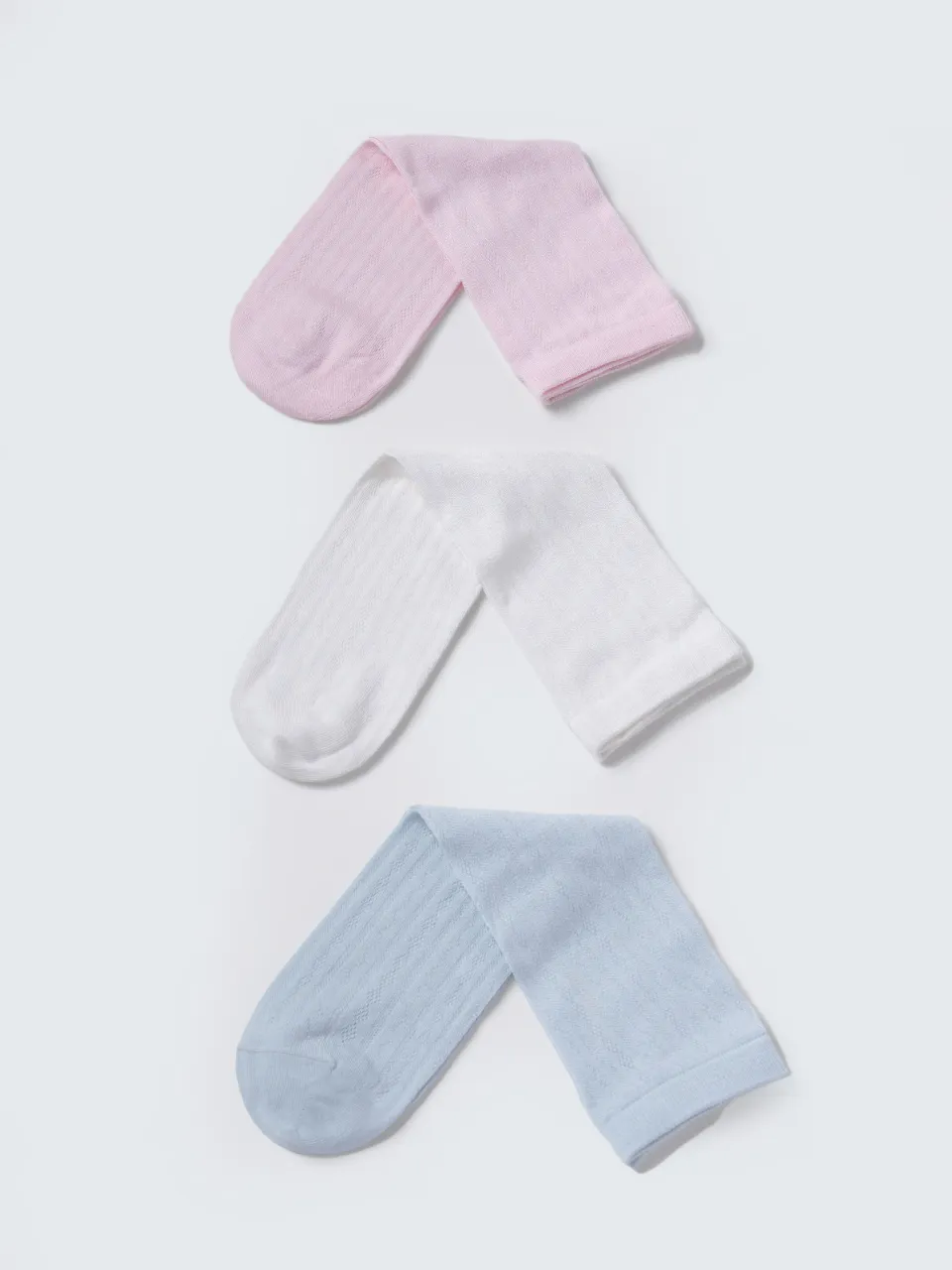 Silk Blend Ribbed Crew Socks — socks arranged in three colors