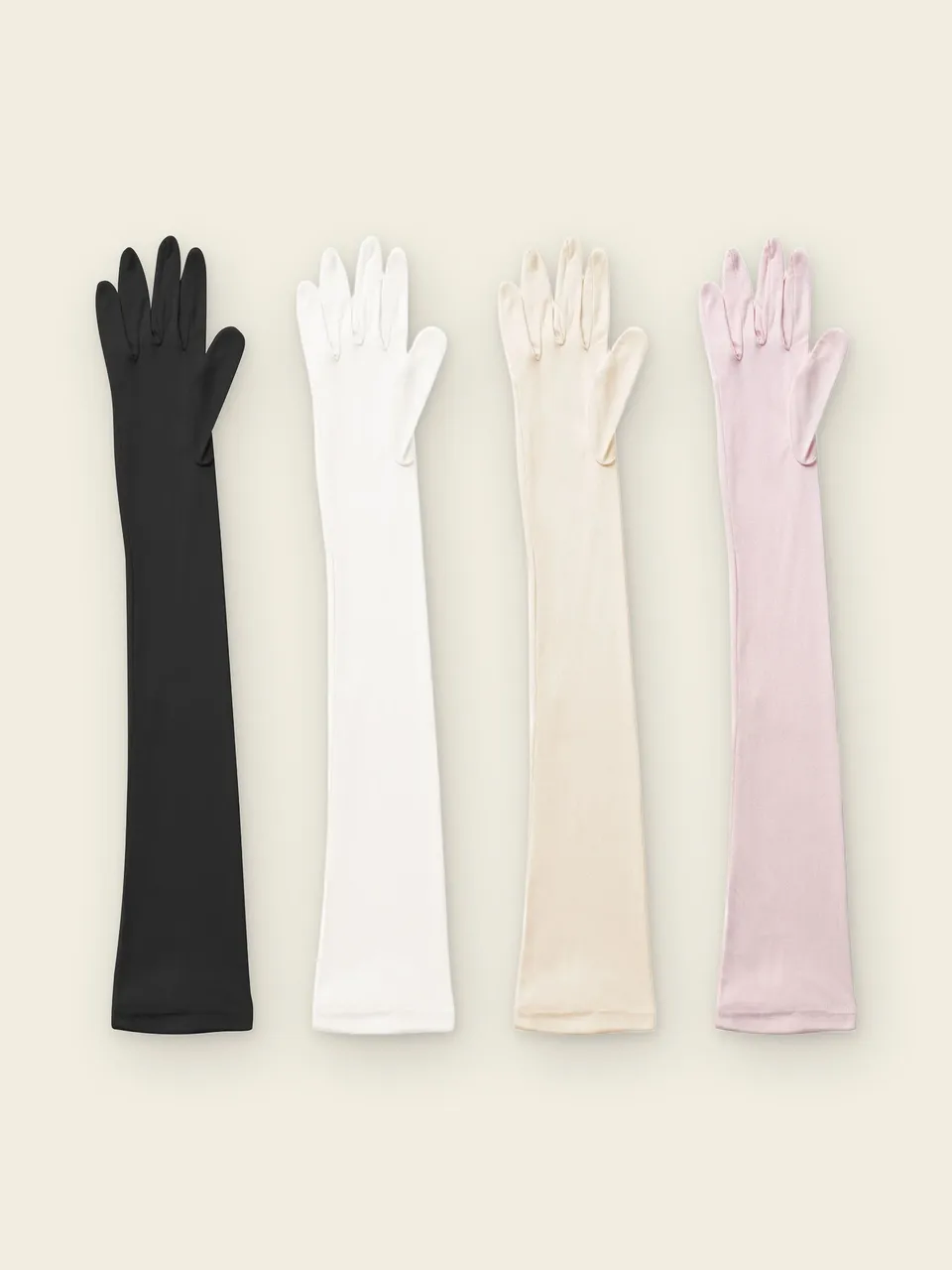 Mulberry Silk Sleep Gloves, on an oat backdrop