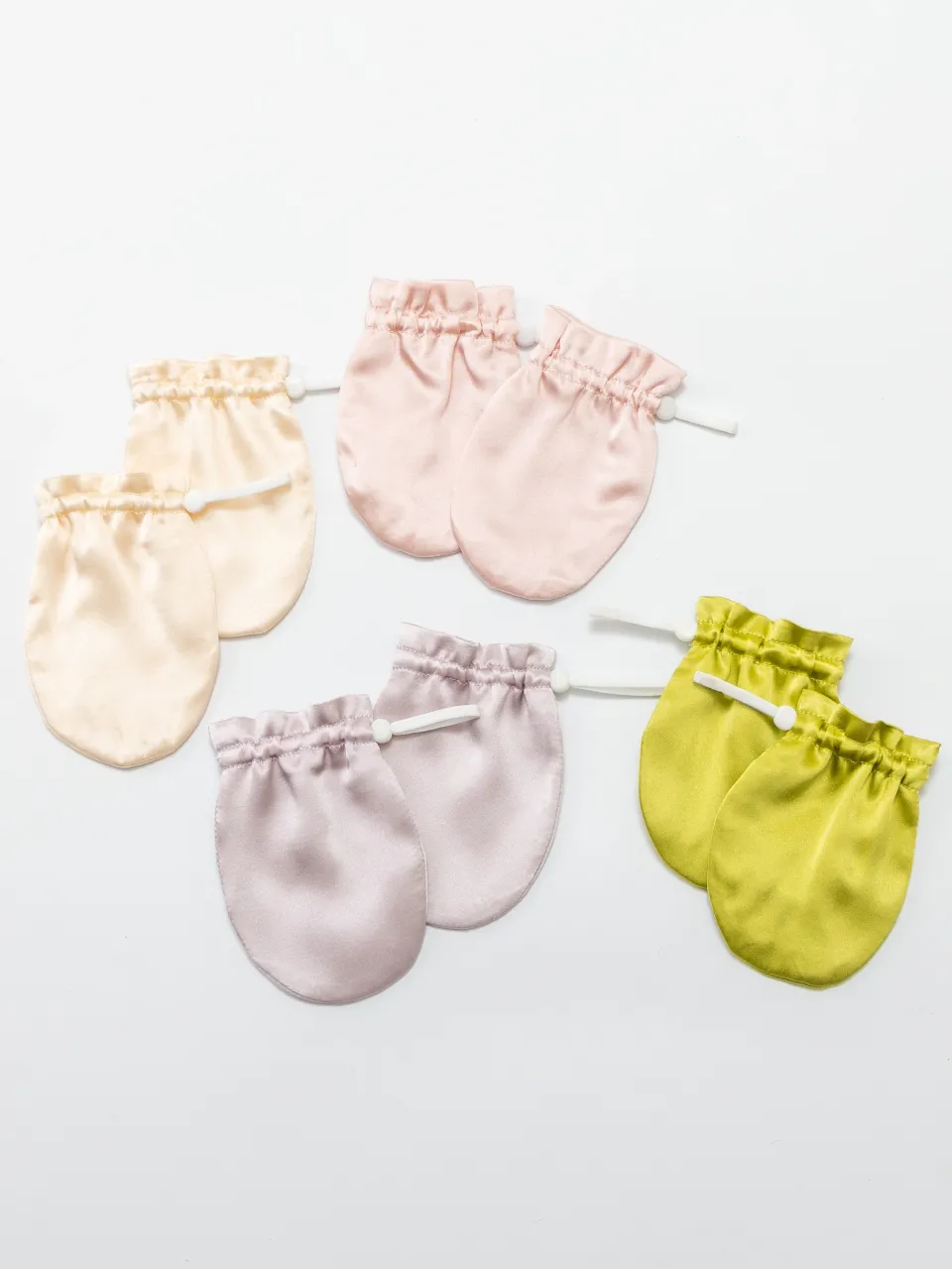 Mulberry Silk Baby Mittens — baby mittens arranged together