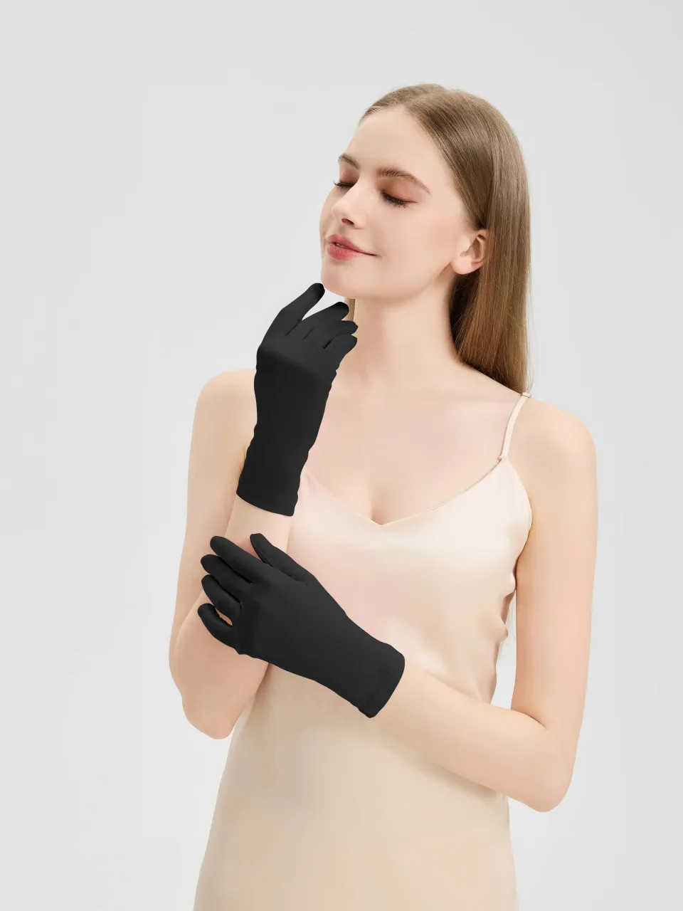100% Mulberry Silk Knit Gloves in Black — gloves worn on a model
