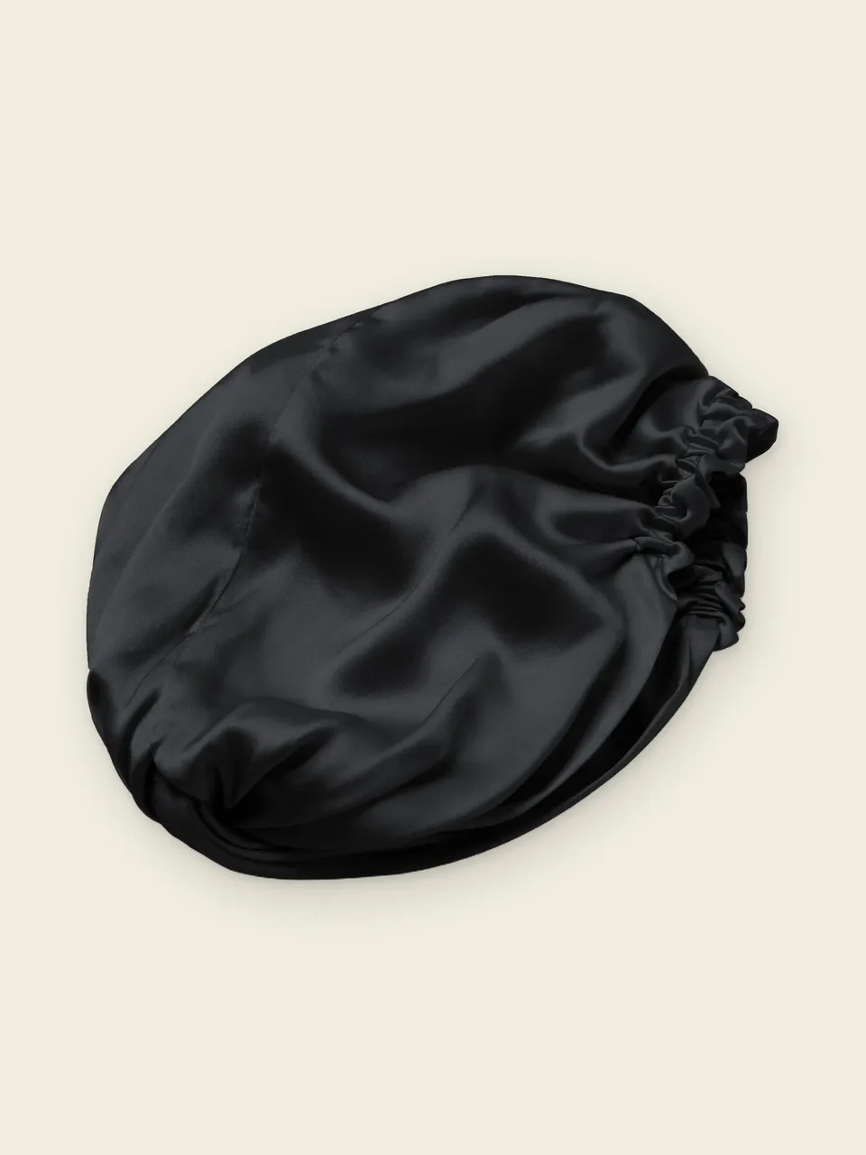 Double Layer Silk Sleep Bonnet with Cross Front, on an oat backdrop