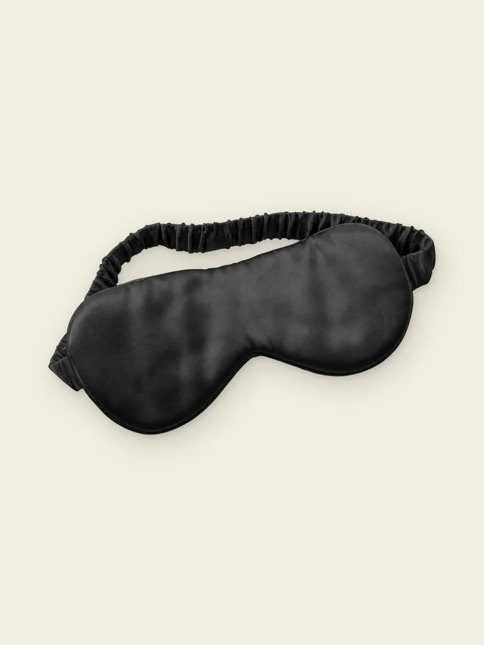 Contoured Mulberry Silk Sleep Mask, on an oat backdrop