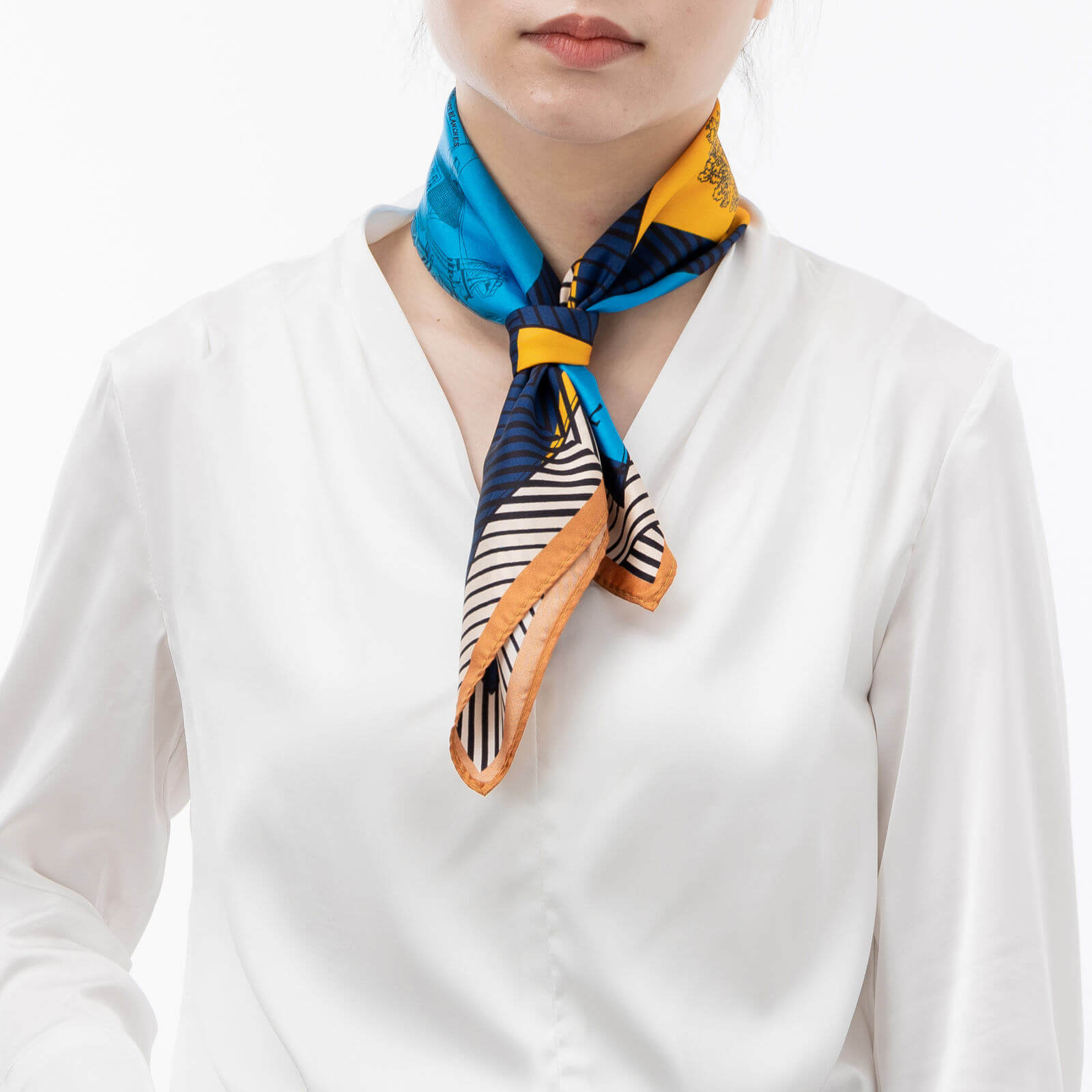 The silk scarf is squarely coming back in style