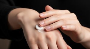hand care guide, cream on hand